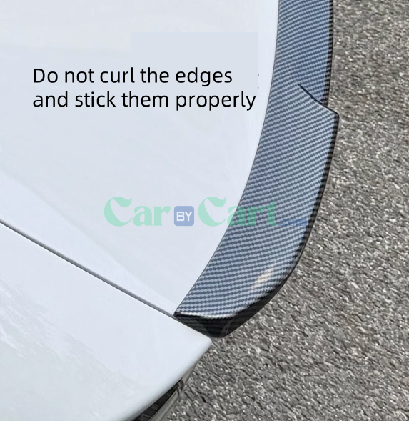 سيارة 2025 BYD Seal 06DM-i مزودة بتقنيات ذكية ومزيّنة بألياف الكربون وخلفيات شفرات.