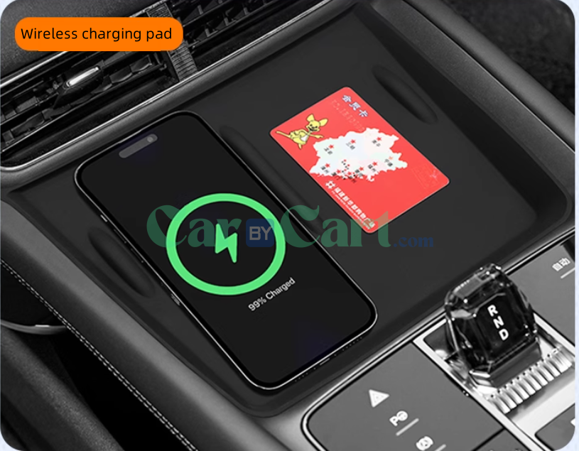 2025 BYD Sea Lion 07EV فيه صندوق مسند ذراع للتحكم المركزي وصندوق تخزين لاسلكي.