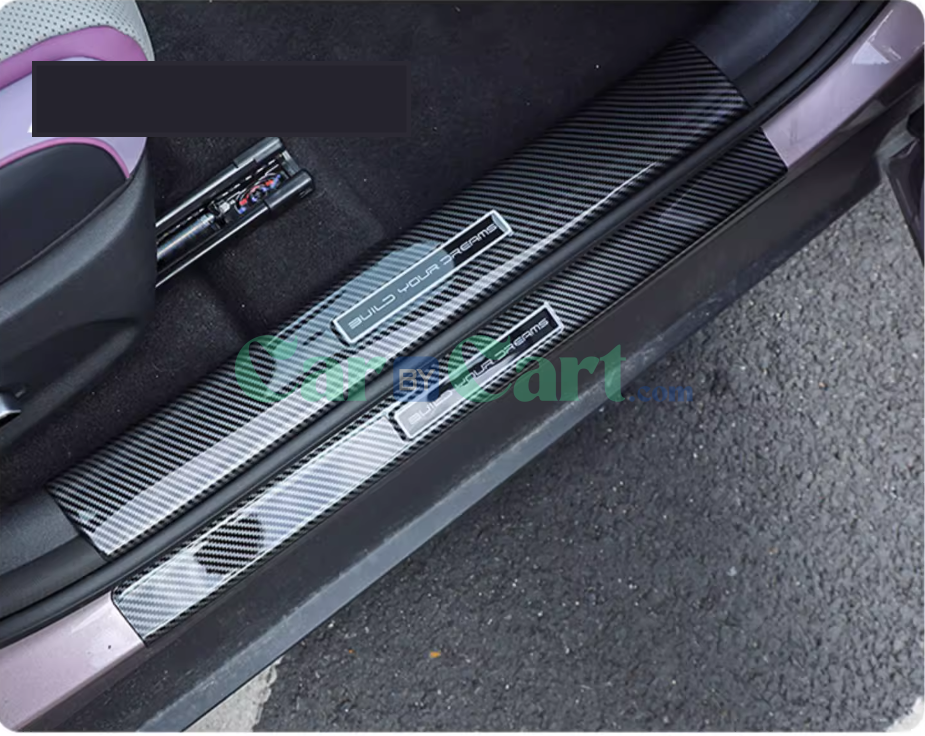 2025 BYD دولفين عندها شرائط عتبة داخلية وخارجية.